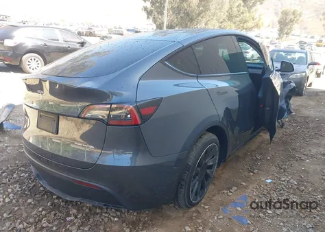 2023 Tesla Model Y Awd/Long Range Dual Motor All-Wheel Drive from USA, damaged, VIN 7SAYGAEE4PF609339
